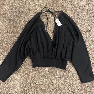 Express size small black flowy top